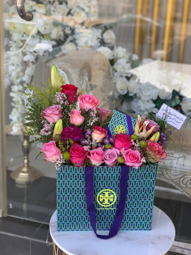 تنسيق مجموعه هدايا على كيس توري بورش