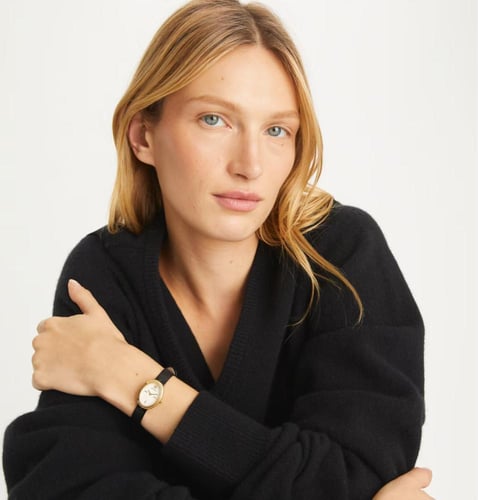 ساعة اسود وذهبي