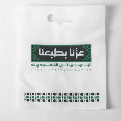 كيس اليوم الوطني - عزنا بطبعنا (ابيض) 30*20