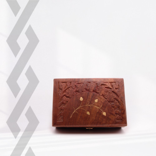 Wooden box decorated with brass