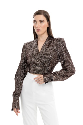 بدله خاصة بجاكيت من الترتر والبنطال الأبيض