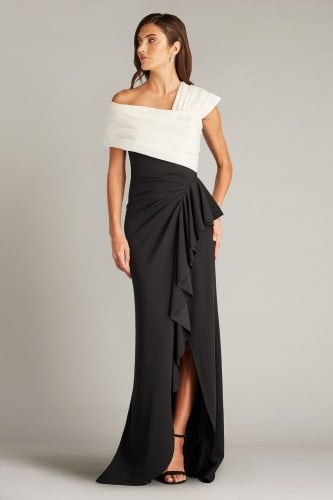 فستان أسود بصدر أبيض وطول غير متماثل