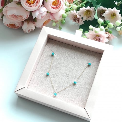 ذهب عيار 18 مع فيروز معالج