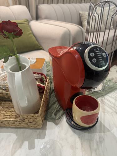 ماكينة قهوة كبسولات دولتشي جينيو اس بلس أحمر