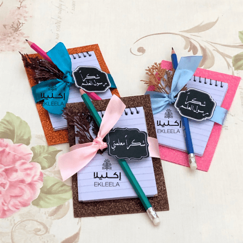 توزيعات يوم المعلم / توزيعات نوته مع قلم رصاص ( 12...