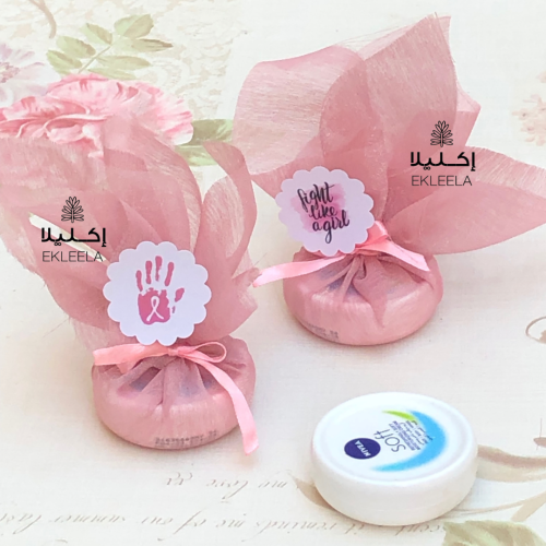 توزيعات لوشن حجم صغير بثيم توعية عن سرطان الثدي (...