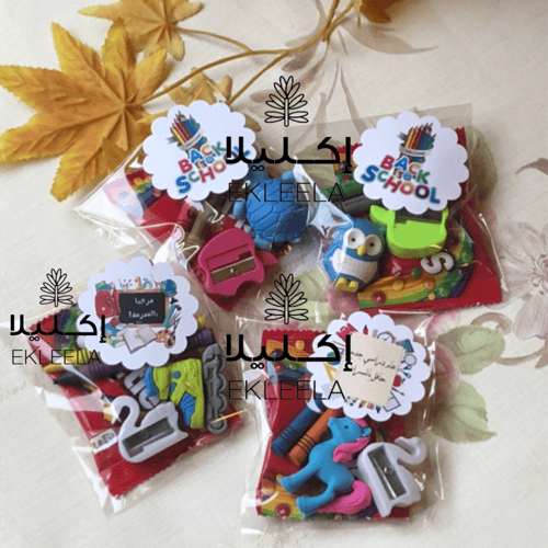 توزيعات مع ثيم ورقي عن العوده للمدرسه ( 12 قطعه )