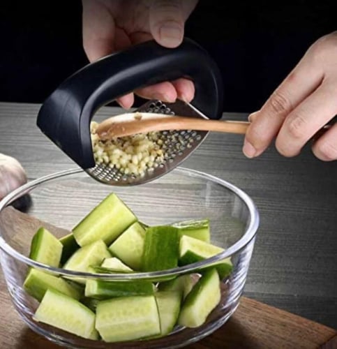 مفرمة ثوم يدويه /هراسة ثوم / فرامه / اداة هرس ثوم...