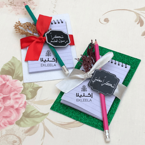 توزيعات يوم المعلم / توزيعات نوته مع قلم رصاص ( 12...