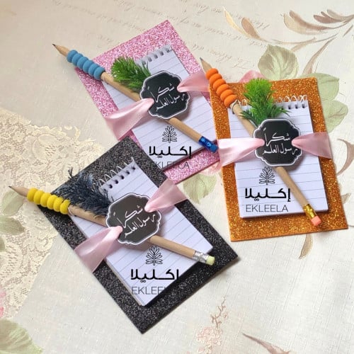 توزيعات يوم المعلم / توزيعات نوته مع قلم رصاص ( 12...