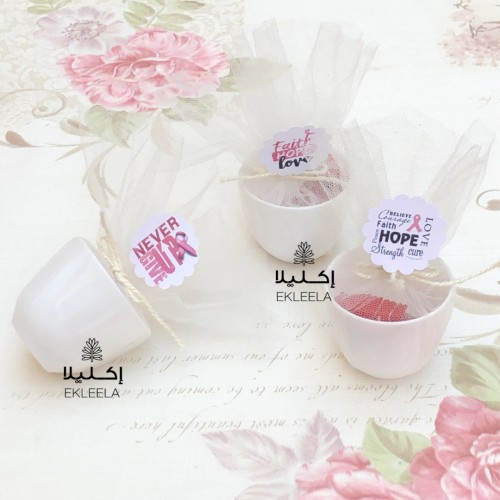 توزيعات فناجين القهوه البلاستيكيه بثيم ورقي عن الت...