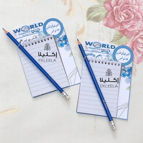 توزيعات نوت و قلم رصاص مع ثيم ورقي عن اليوم العالم...