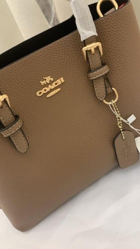 25 Moly coach