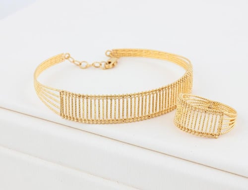 سواره ذهب عيار 21 مع الخاتم تصميم دوريكا- عيار21