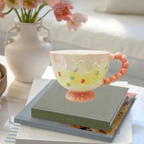 Ceramic mug with colorful patterns