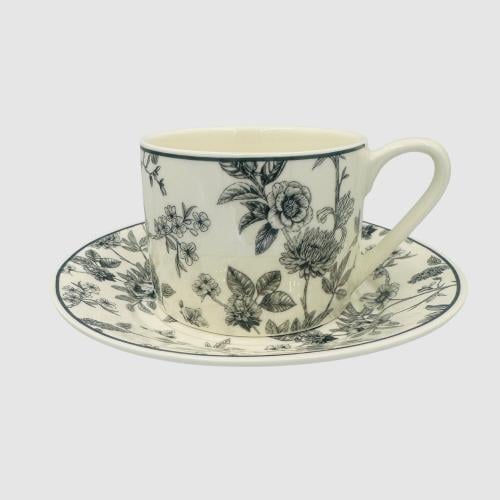 Ceramic mug with a black rose design plate