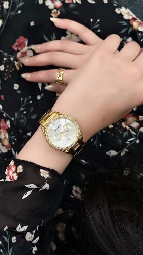 ساعه نسائي دي كابري ذهبي مينا ابيض - DI9637