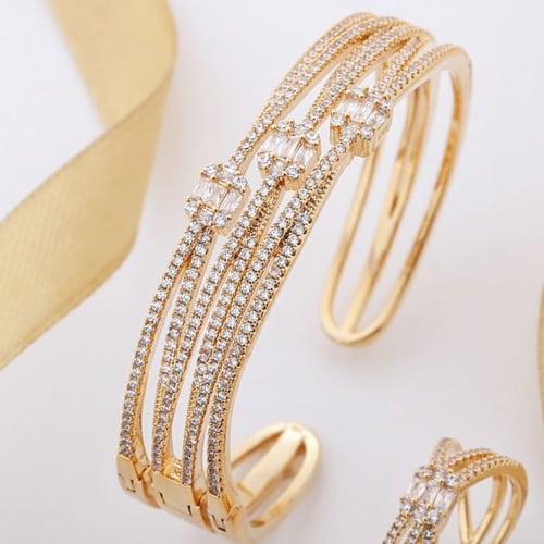 اسوارة وخاتم فخمة ذهبية