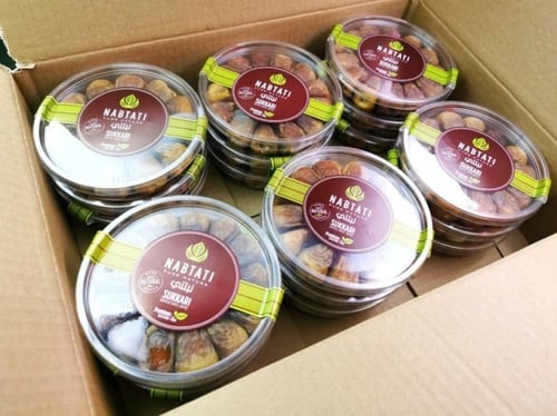 18 علبة سكري رطب ملكي 195جرام