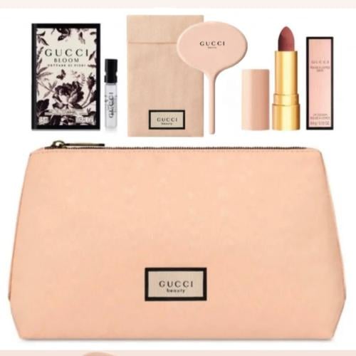 طقم قوتشي (شنطة الزهرية للمكياج/ روج قوتشي اصلي/ م...