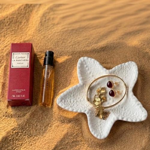 5 توزيعات كارتير : عطر كارتير امبولات مع قاعدة بشك...