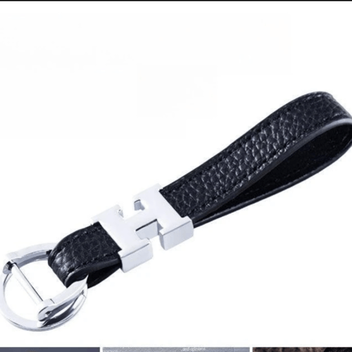 10 توزيعات ميداليه جلد H في علبه مع شريط بتصميم اي...