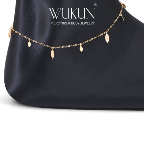 خلخال ذهب عيار 18k بأشكال ورق شجر معلقة بفصوص