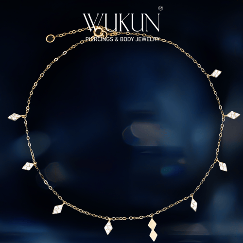 خلخال ذهب عيار 18k بأشكال معين معلقة بفصوص