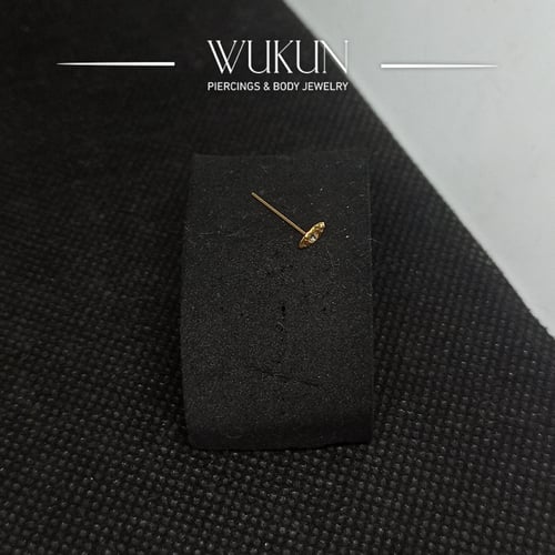 زمام بيرسينج ذهب عين بفص أبيض