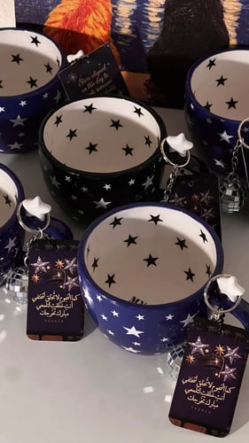 كوب فخار اسود بعبارة انت نجمي الوحيد