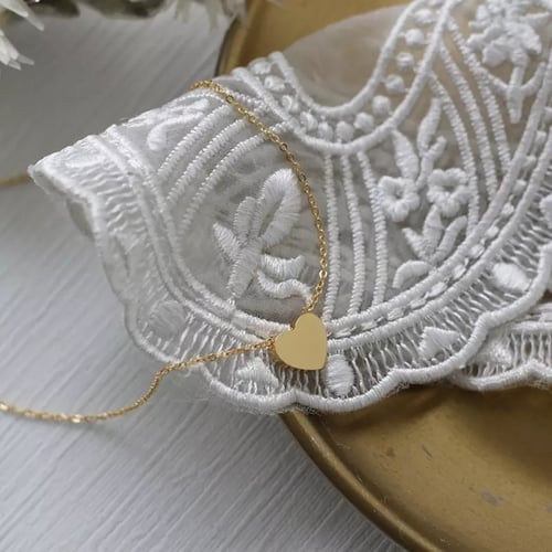 قلاده مطليه ذهب عيار 18k بوجهين بعباره قلبي امتلى...