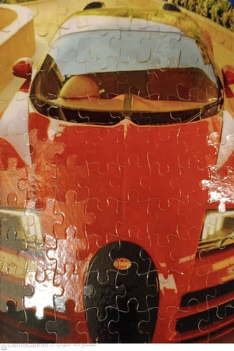 بازل الابعاد 24 سم طول و 19 سم عرض