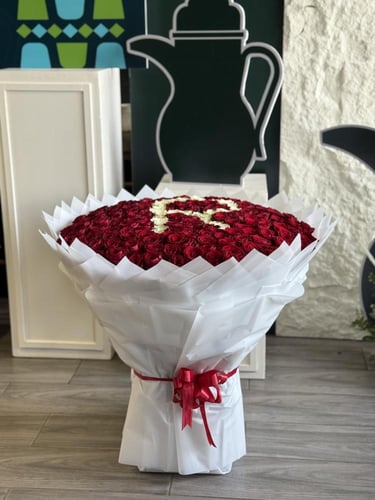 باقة ورد الجوري مع ضاقة حرف