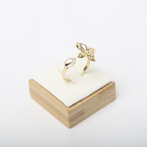 Gold ring with diamond design, 18 karat, weight 2....