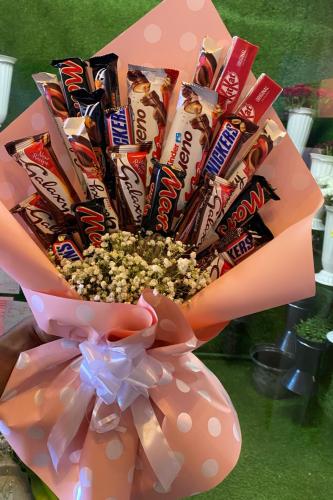Assorted roses and chocolates