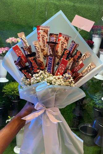 Assorted roses and chocolates