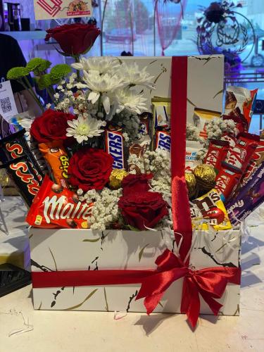 Assorted roses and chocolates