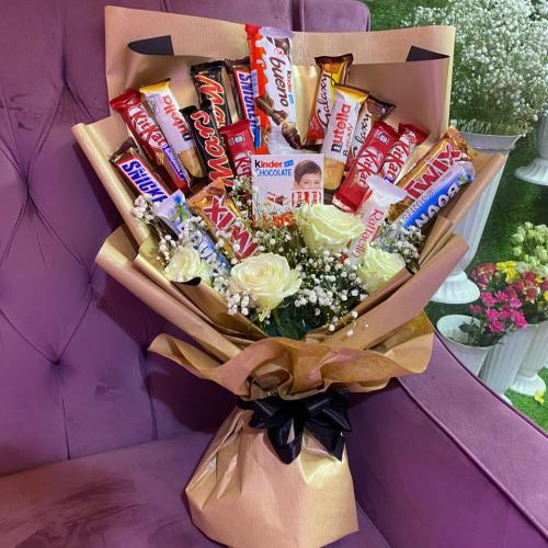 Assorted roses and chocolates
