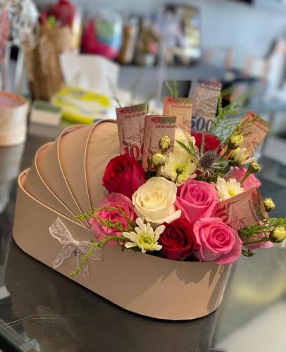 Box with his/her child and flowers