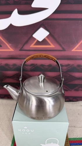 ابريق ياباني ملبس يد جلد