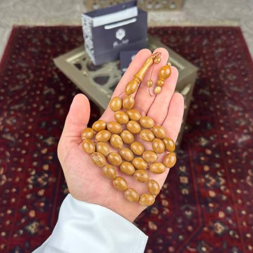 Wooden prayer bead, coconut, oval story