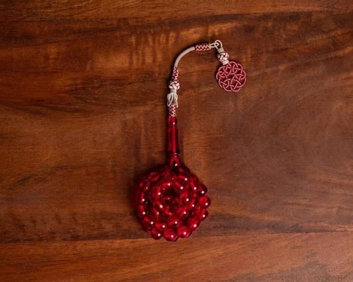 مسباح بكلايت احمر شفاف