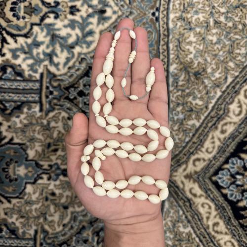 A rosary from old cast handles
