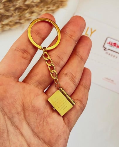 ميداليه بتصميم جديد مع الدفتر