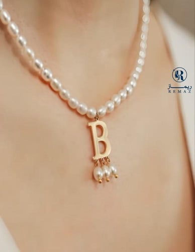 سلسال مشبوك باللؤلؤ بالحرف