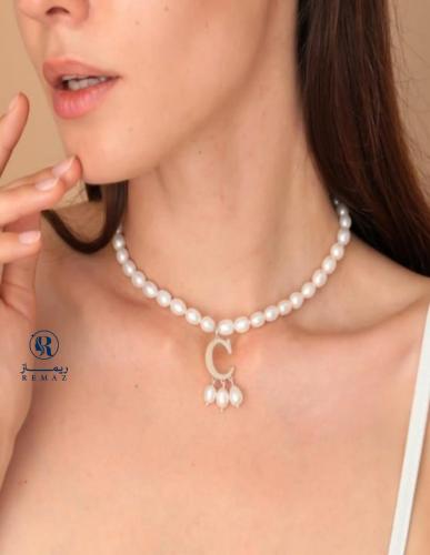 سلسال مشبوك باللؤلؤ بالحرف