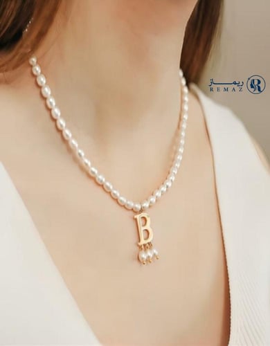 سلسال مشبوك باللؤلؤ بالحرف