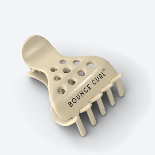 مشابك لرفع الجذور وإعطاء كثافة من باونس كيرل