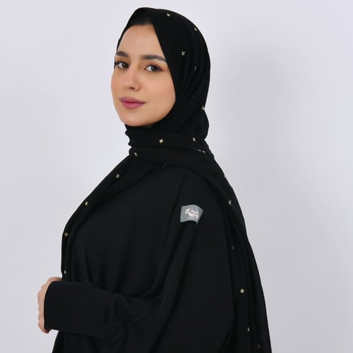 طرحه حرير سوداء بزهور ذهبيه صغيره متفرقة