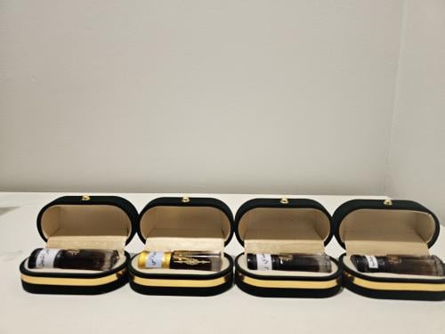 تولة دهن لاوسي مقطر على الحطب